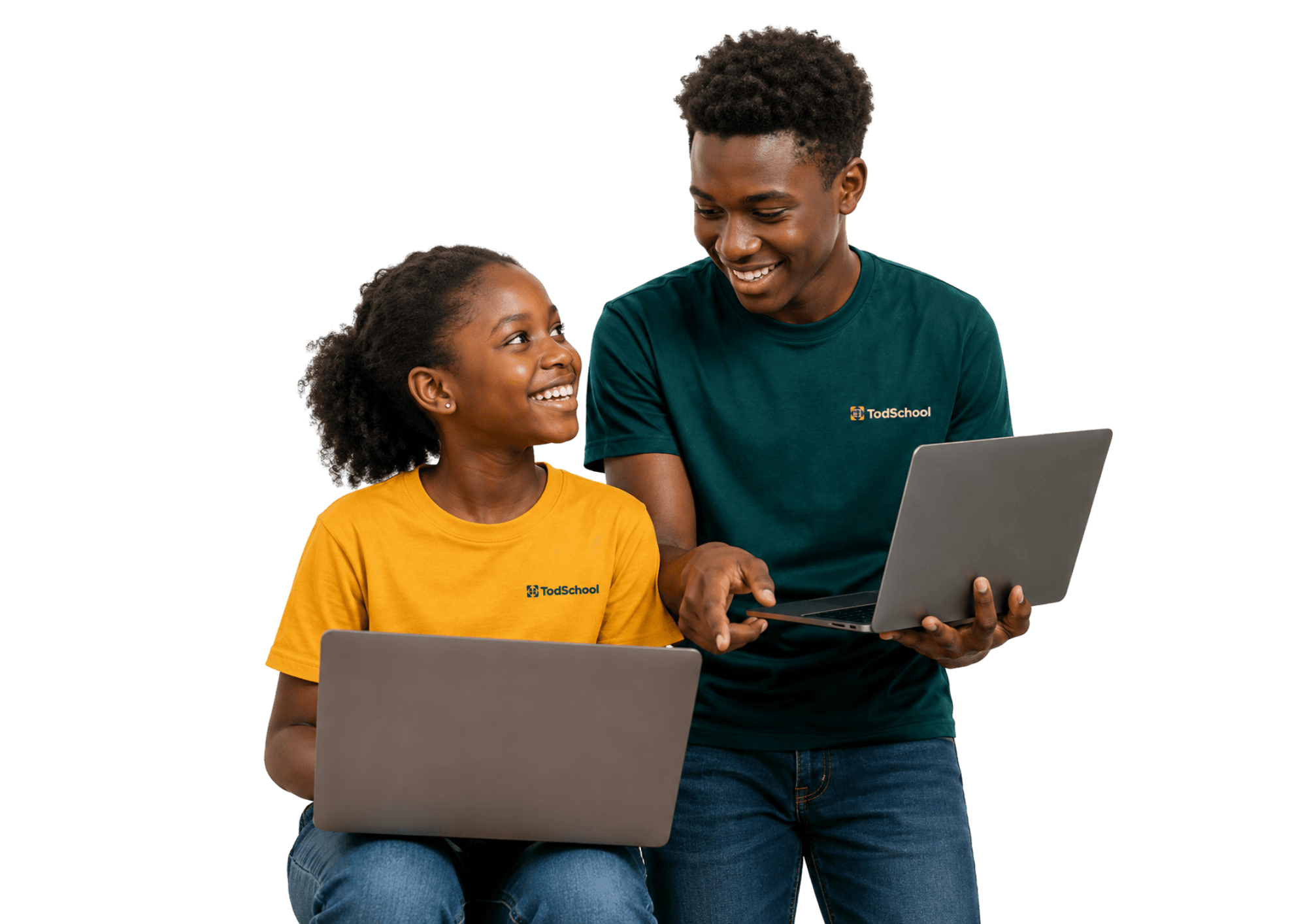 Two TodSchool learners collaborating on laptop projects